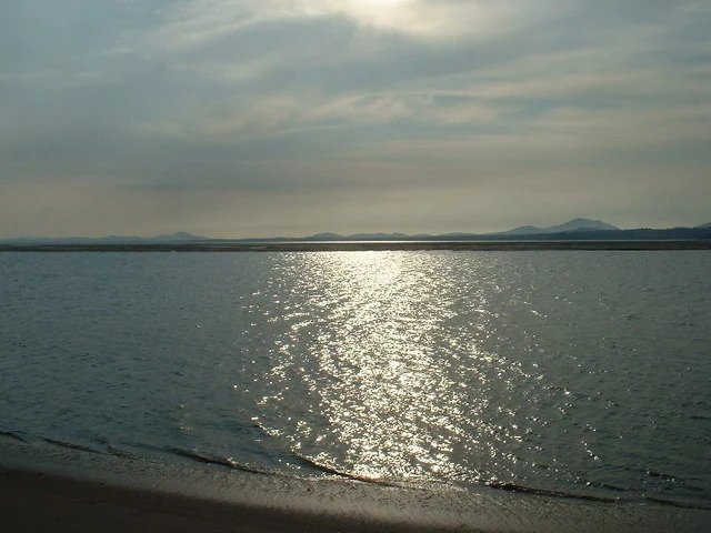 Westward view across the Glaslyn channel towards the Llyn Peninsula, Gwynedd, Wales Coast Path.