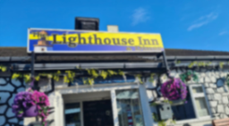 The Lighthouse Inn logo